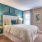 bedroom with large windows and modern decor