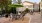 outdoor dining area with big umbrellas and much seating